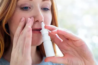 photo of using nasal decongestant spray
