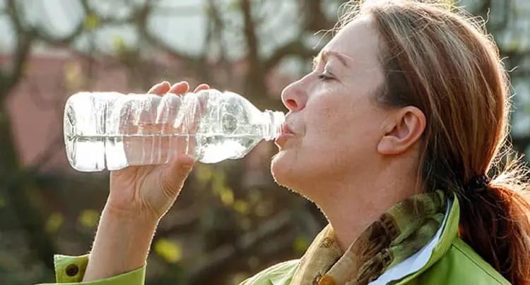 woman drinking water