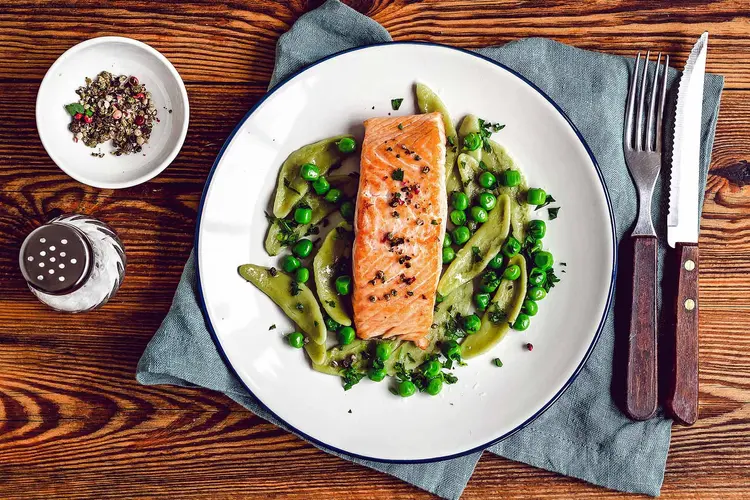 photo of baked salmon with spinach pasta