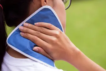 photo of applying gel pack to neck