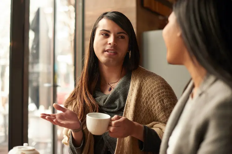 Photo of friends talking over coffee