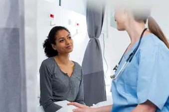 photo of smiling patient with doctor