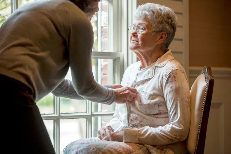 photo of helping to put on pajamas