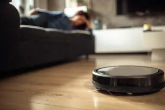 photo of robot vacuum cleaner at home