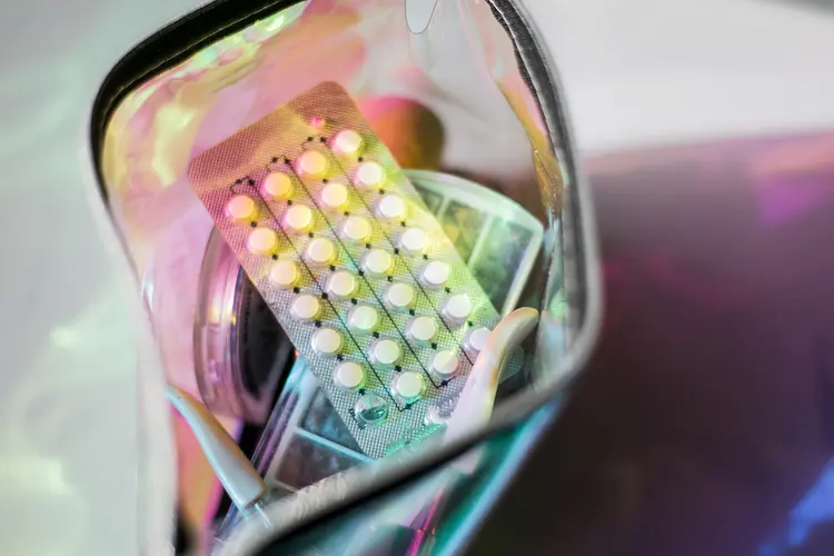 photo of pack of birth control pills in purse