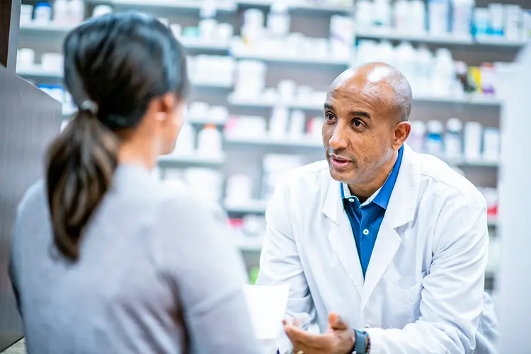 photo of Pharmacist providing medication