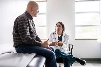 photo of doctor patient consultation