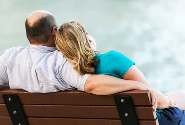 mature couple on park bench