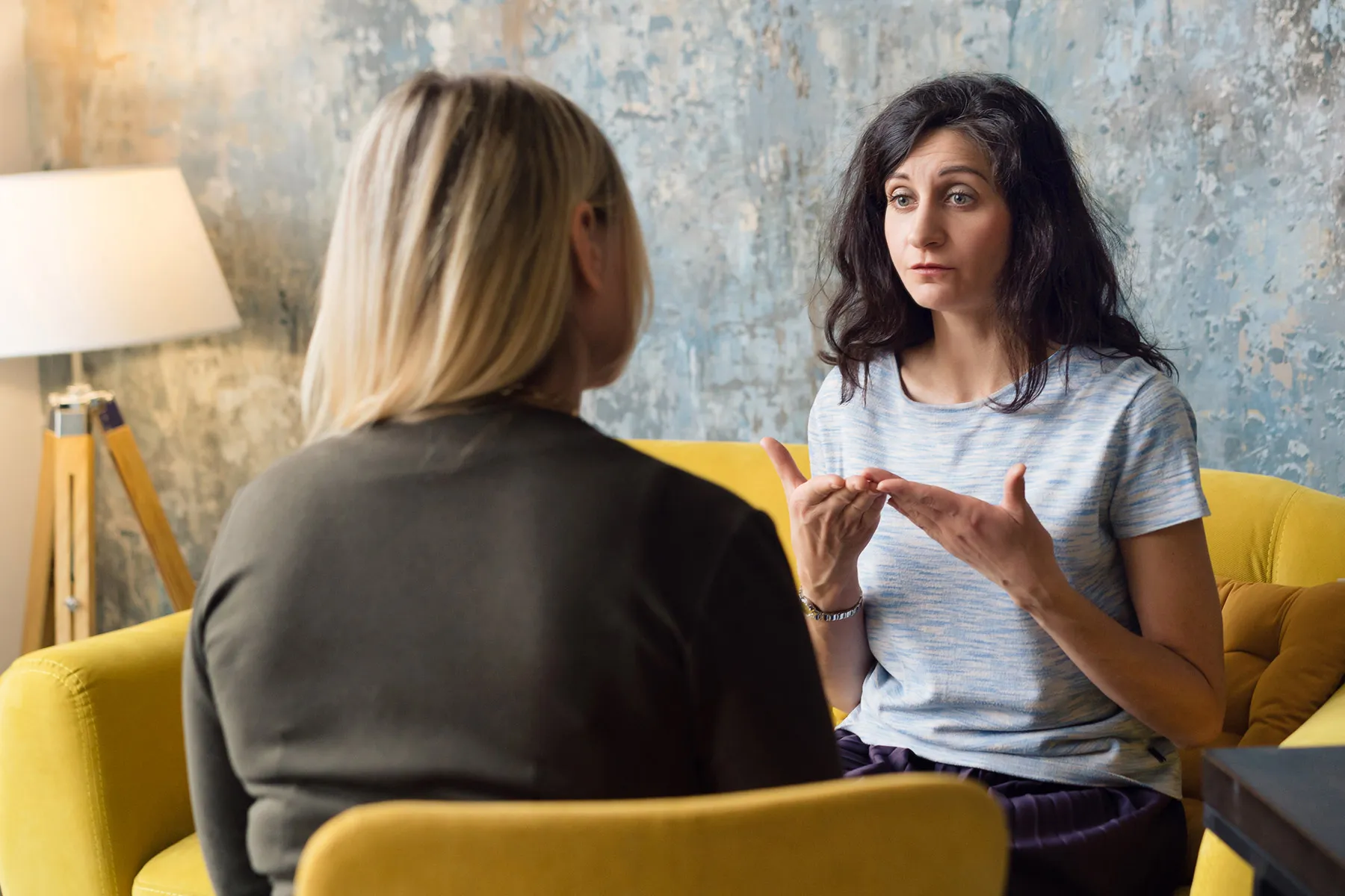 photo of young woman in talk therapy session