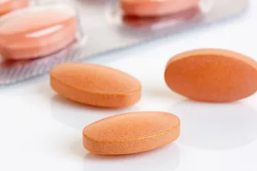 Statins are a class of drugs often prescribed by doctors to help lower cholesterol levels in the blood, which can help prevent heart attacks and strokes. Most people who take statin drugs tolerate them very well. But some people have side effects, which can include headache, having a hard time sleeping, or flushing of the skin. (Photo credit: iStock/Getty Images)