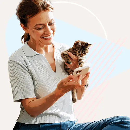 photo of woman holding cat